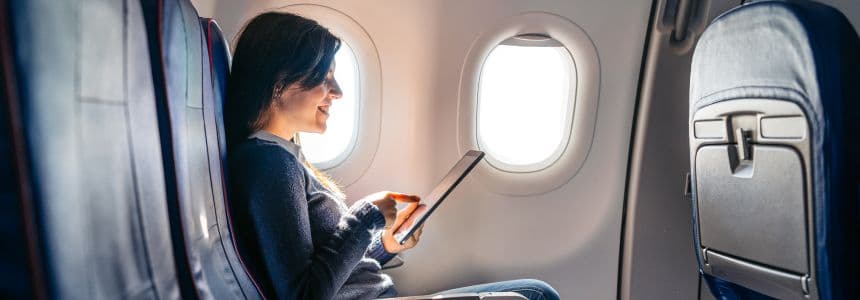 woman sitting in empty row