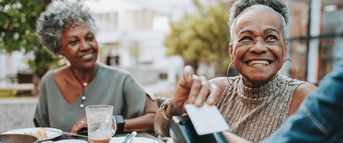 woman paying with credit card
